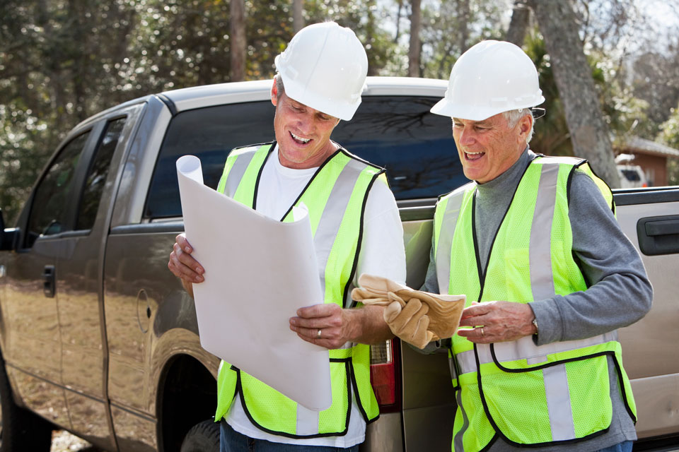 Two workers wearing hardhats